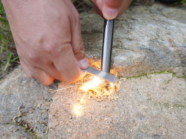 How to start a fire with a fire starter. Step 4 Brace
