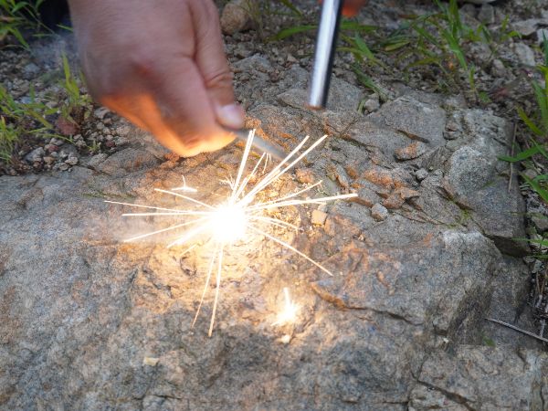 How to start a fire with FERROFIRE fire starter. Step 5 Pull